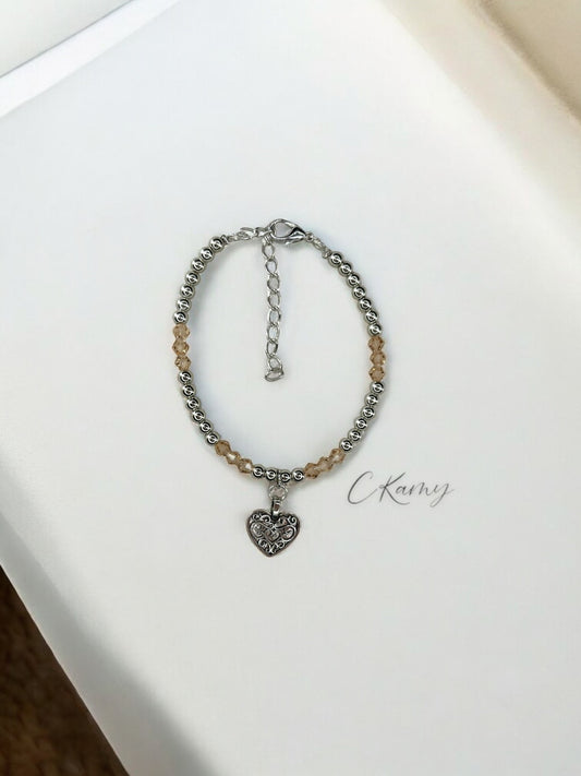 Bracelet femme coeur ancien perles toupies beige