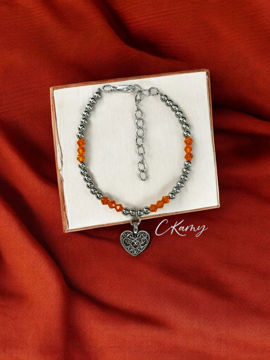 Bracelet femme coeur ancien perles toupies orange
