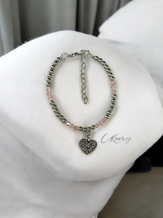 Bracelet femme coeur ancien perles toupies rose