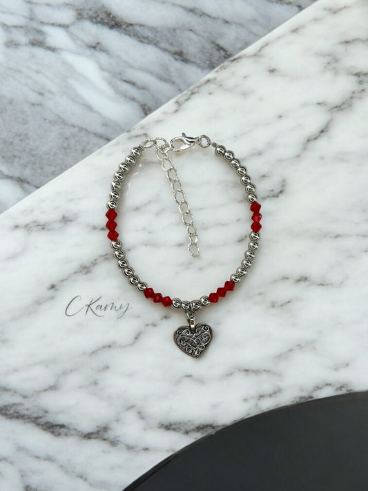 Bracelet femme coeur ancien perles toupies rouge