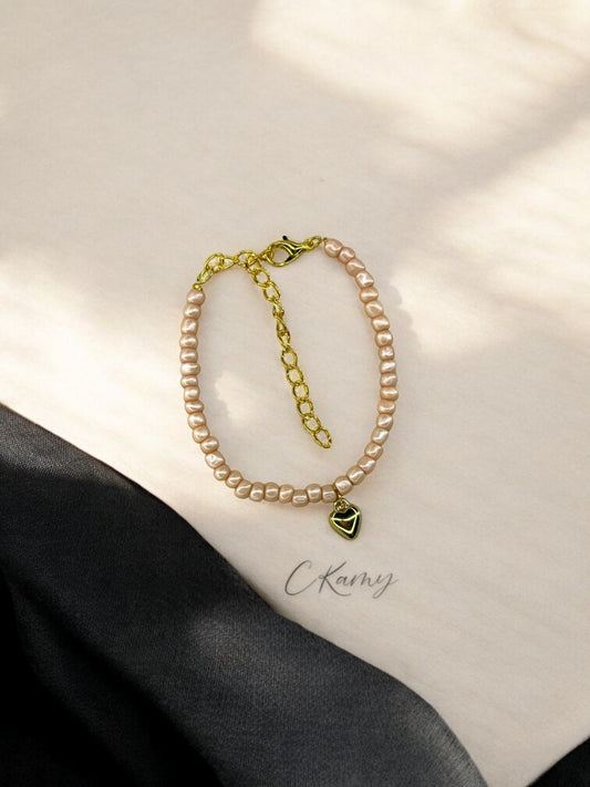 Bracelet femme coeur bombé rocaille chair clair