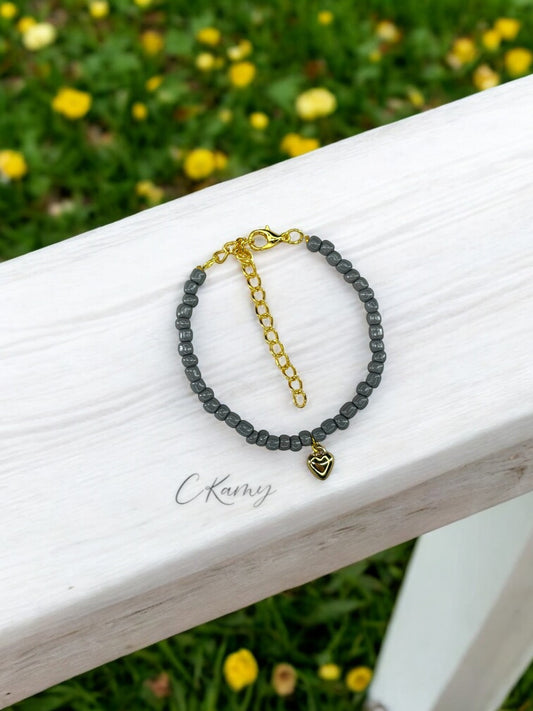 Bracelet femme coeur bombé rocaille gris foncé