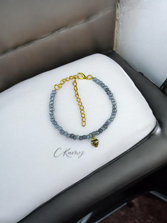 Bracelet femme coeur bombé rocaille gris tacheté foncé
