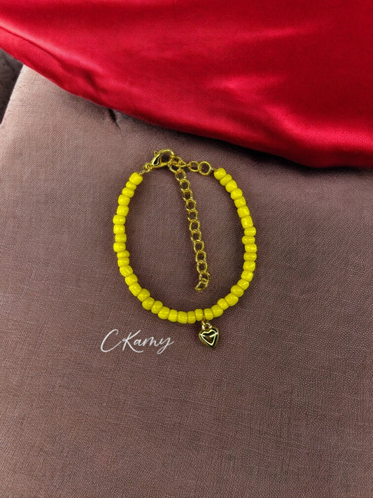 Bracelet femme coeur bombé rocaille jaune