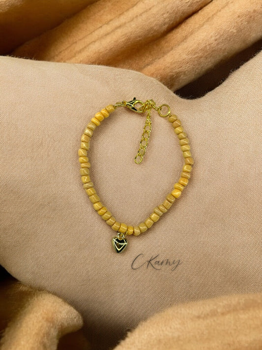 Bracelet femme coeur bombé rocaille marron clair