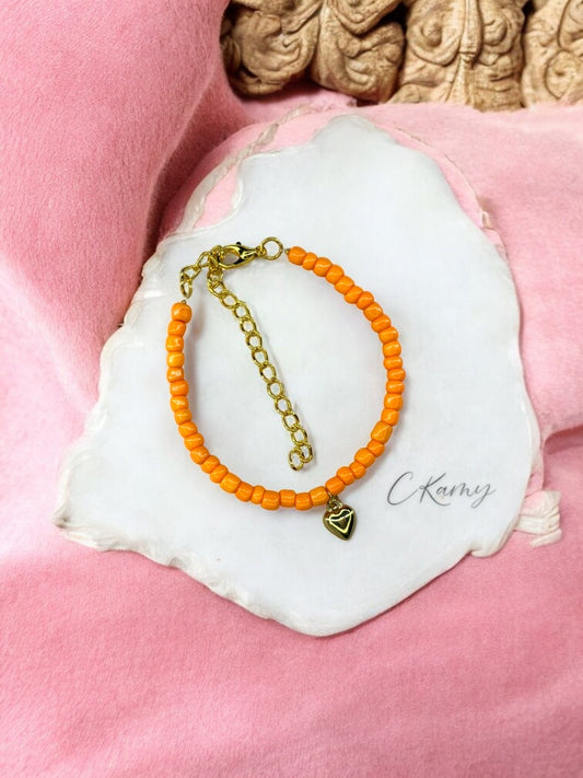 Bracelet femme coeur bombé rocaille melon