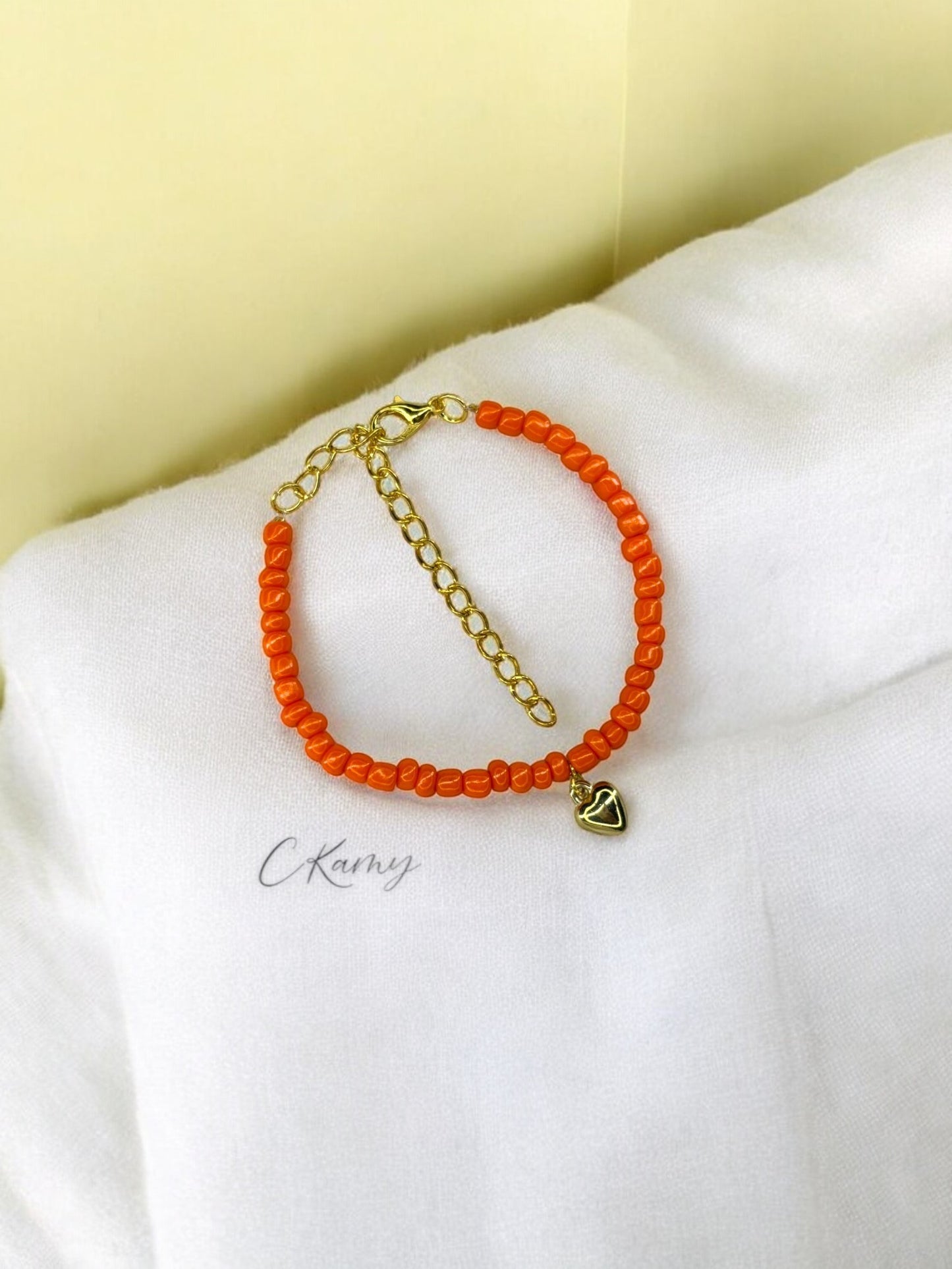 Bracelet femme coeur bombé rocaille orange