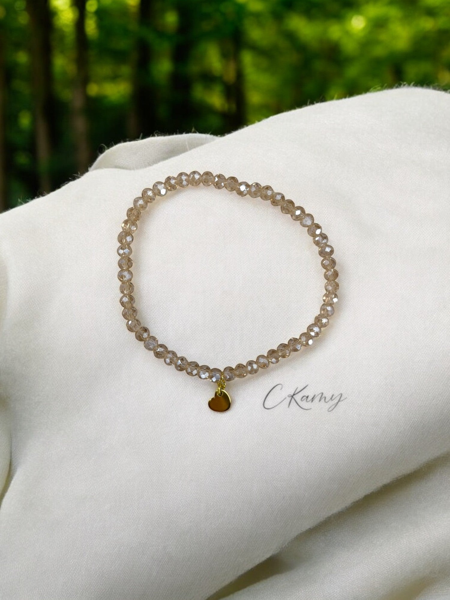 Bracelet femme coeur doré facettes 4mm beige