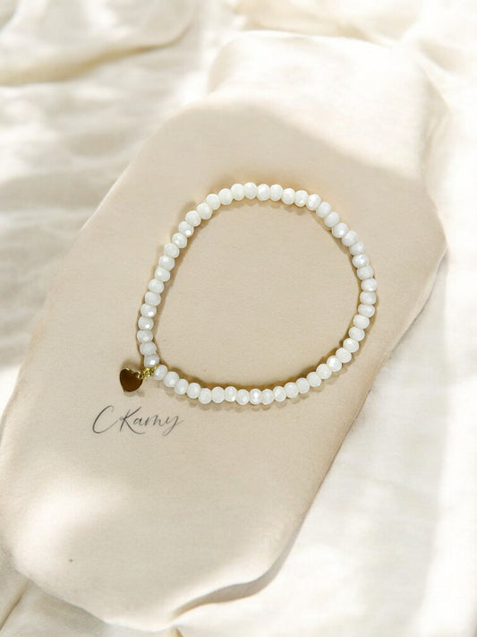 Bracelet femme coeur doré facettes 4mm blanc