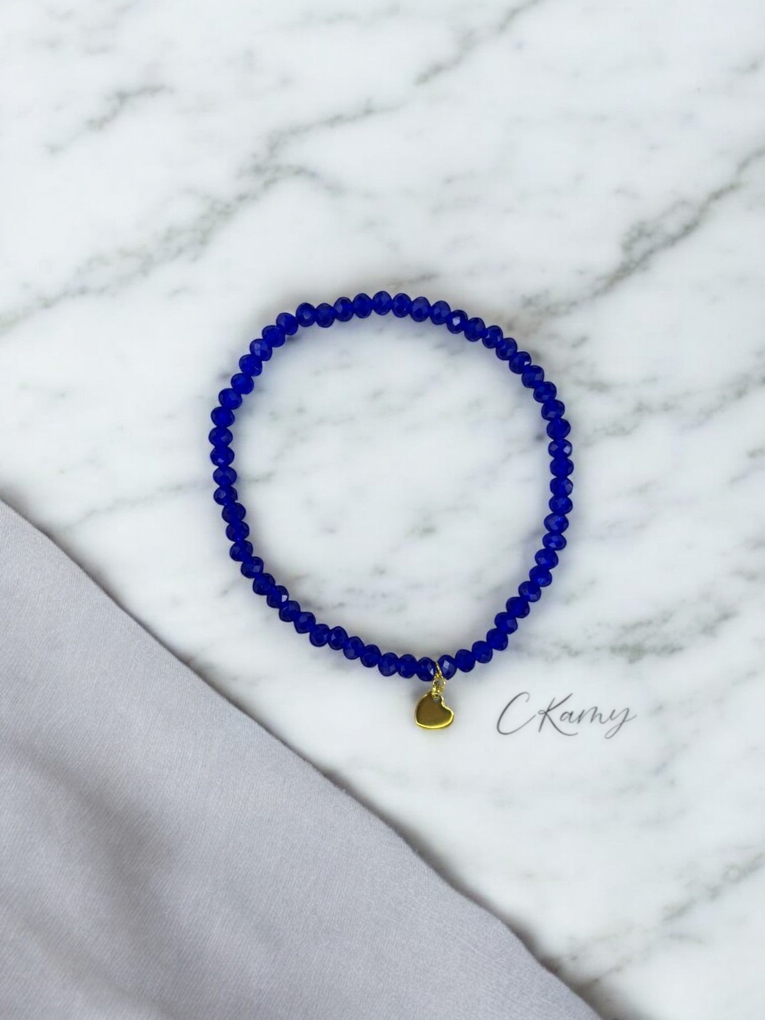 Bracelet femme coeur doré facettes 4mm bleu saphir