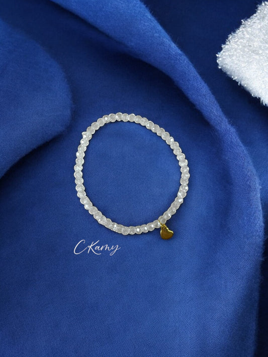 Bracelet femme coeur doré facettes 4mm transparent