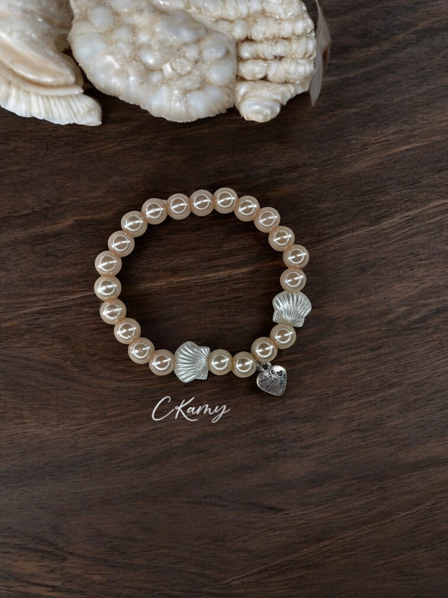 Bracelet femme coquillage nacré coeur chair clair brillant