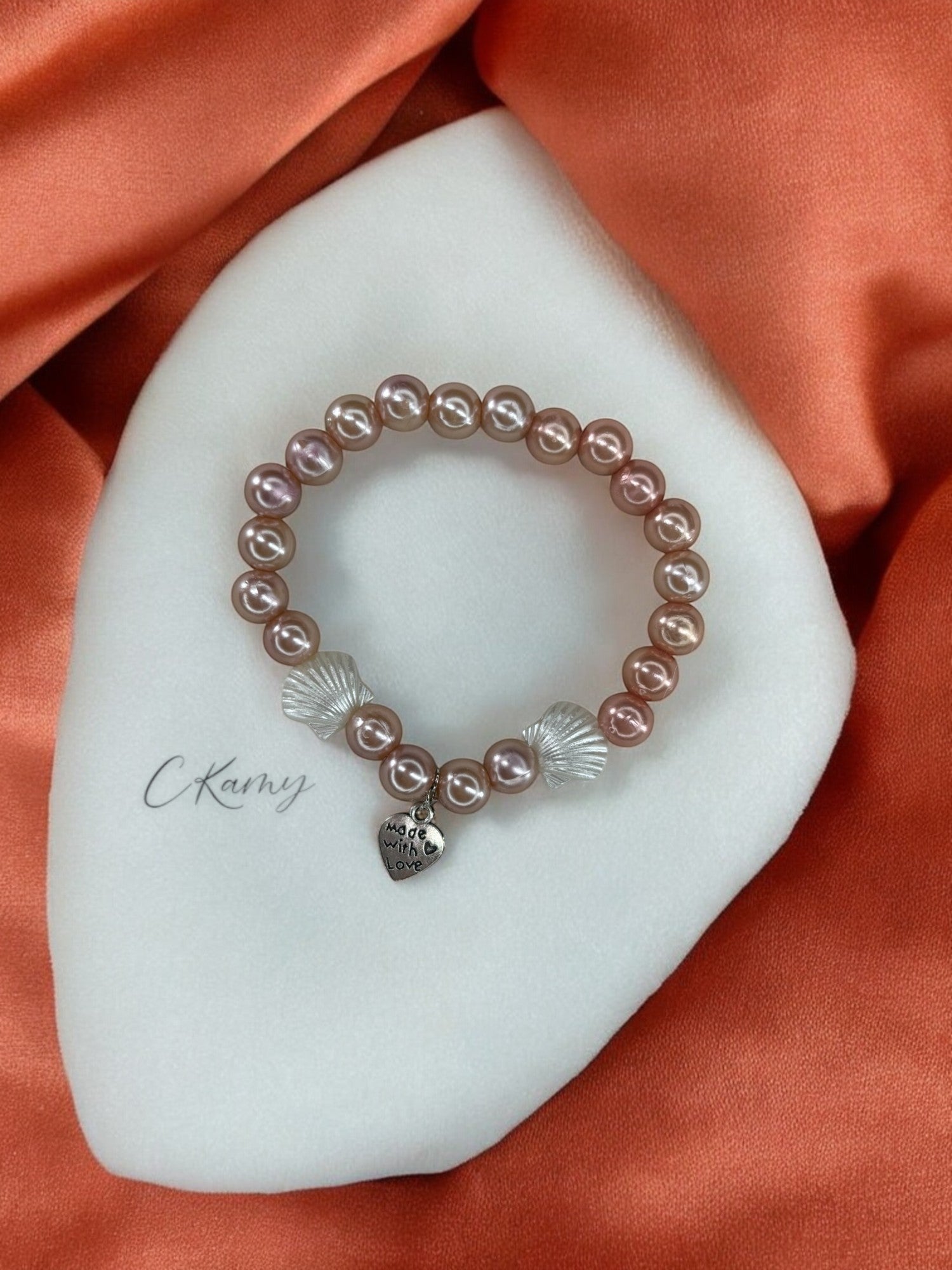 Bracelet femme coquillage nacré coeur chair foncé brillant