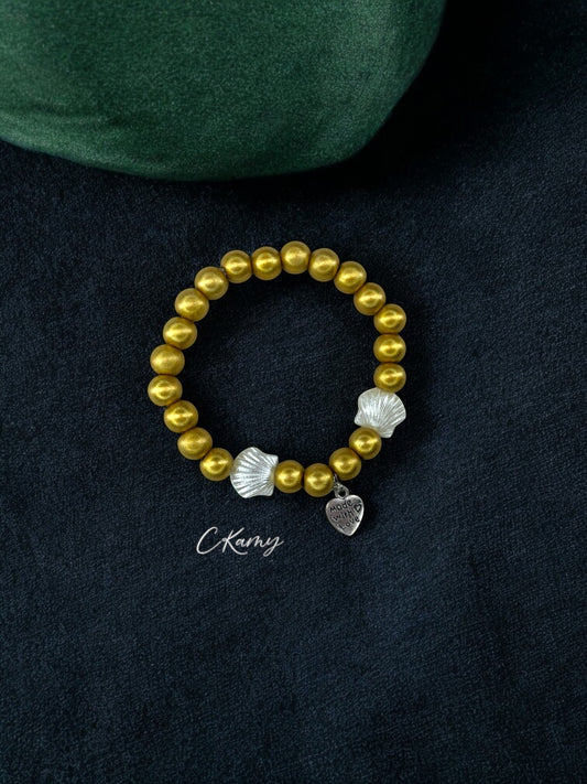 Bracelet femme coquillage nacré coeur doré foncé mat