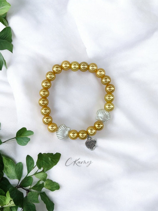 Bracelet femme coquillage nacré coeur jaune blond brillant