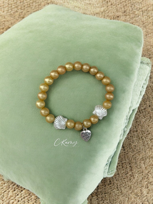Bracelet femme coquillage nacré coeur jaune sable mat