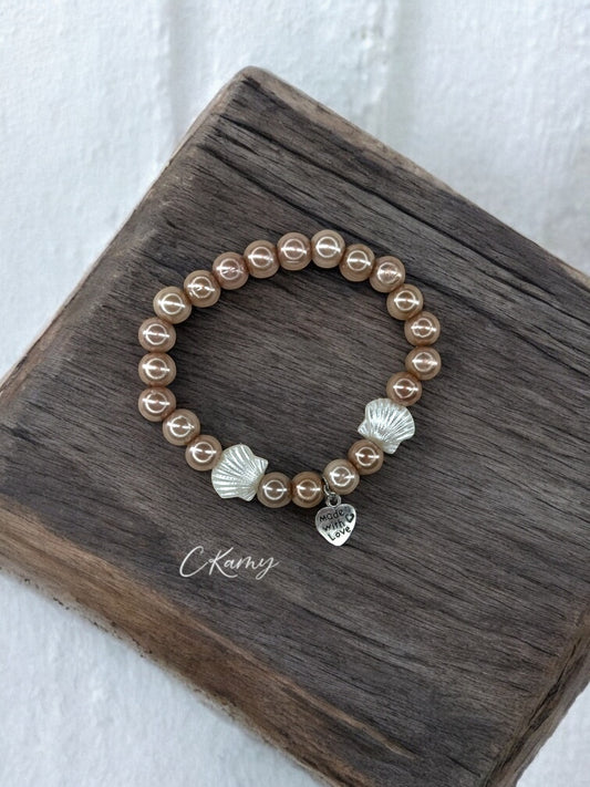 Bracelet femme coquillage nacré coeur taupe brillant