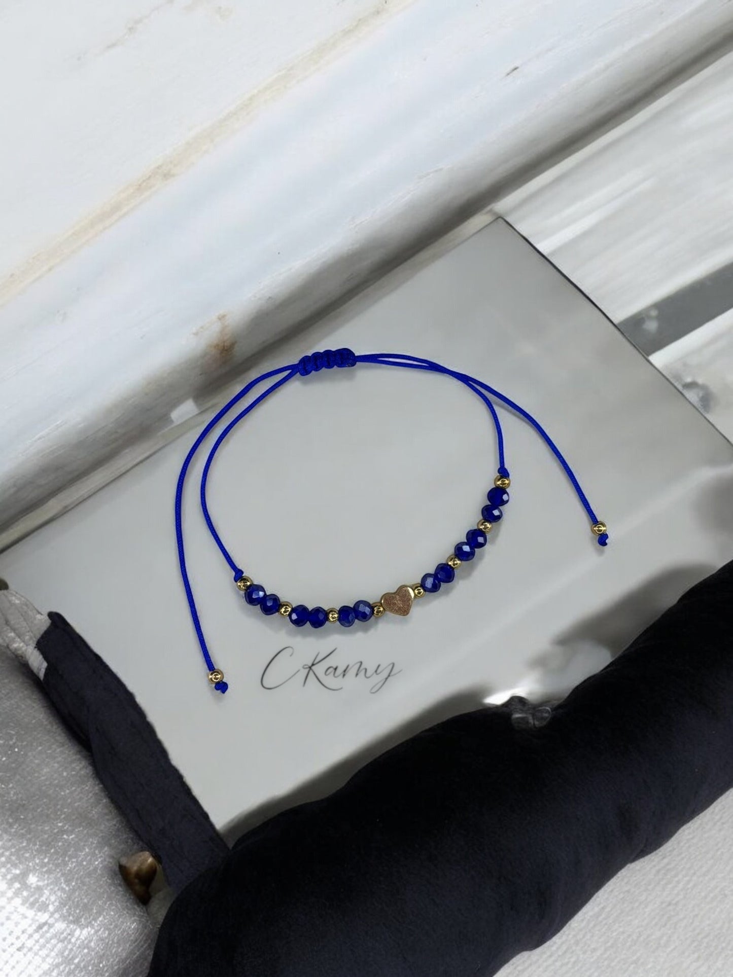 Bracelet femme cordon coeur doré facettes bleu foncé