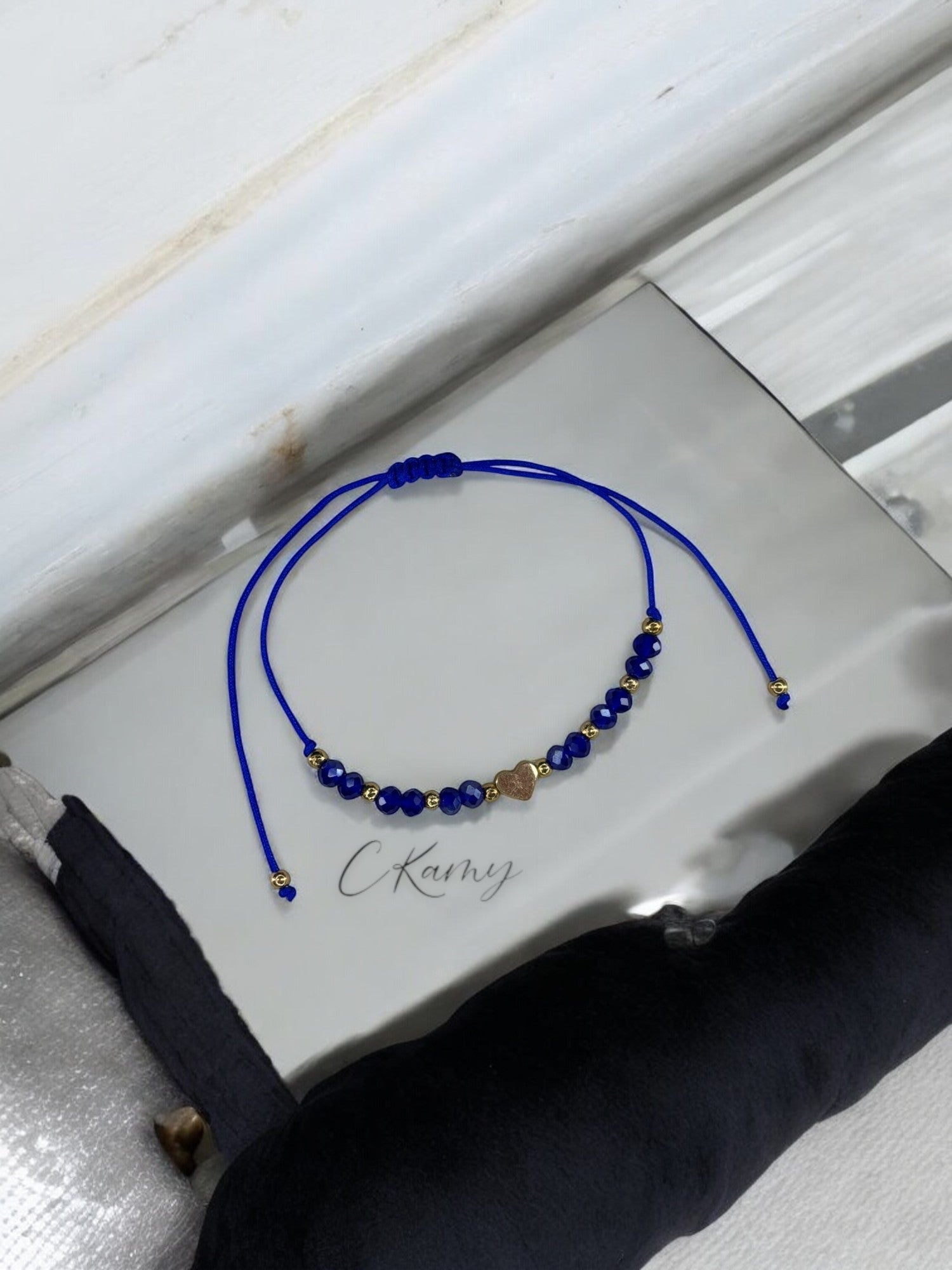 Bracelet femme cordon coeur doré facettes bleu foncé