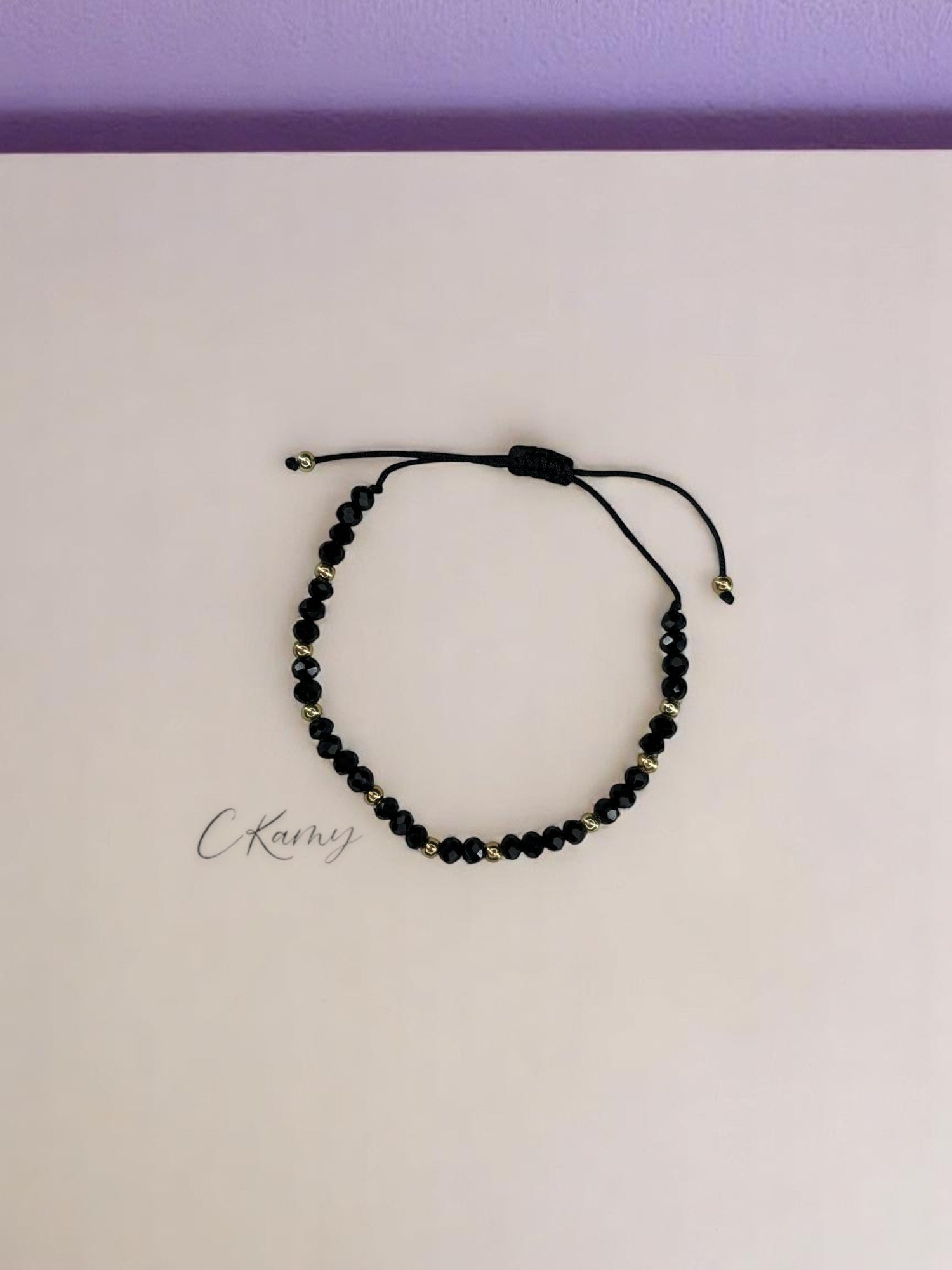Bracelet femme cordon facettes noir