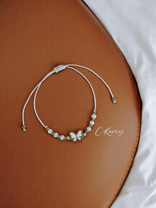 Bracelet femme cordon papillon couleur facettes blanc