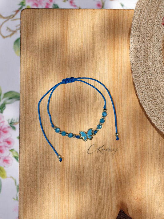 Bracelet femme cordon papillon couleur facettes bleu