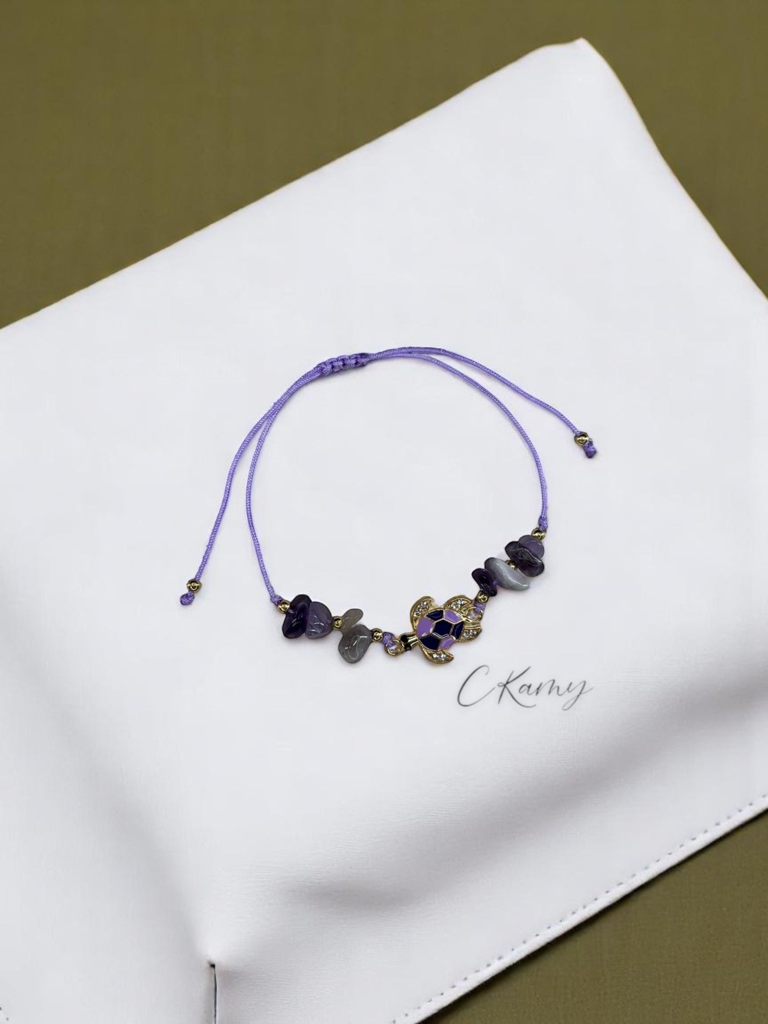 Bracelet femme cordon tortue violet foncé