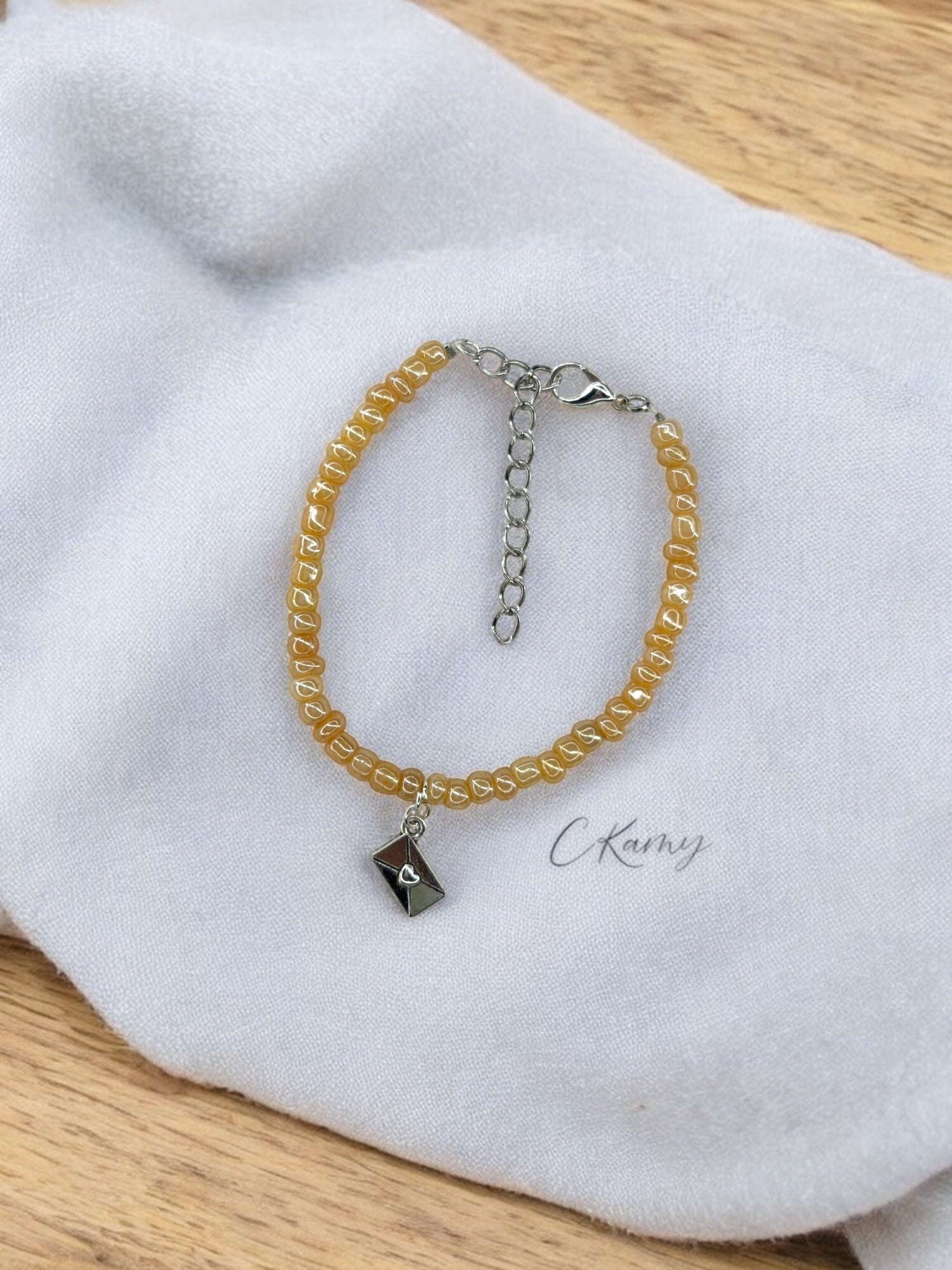 Bracelet femme courrier rocaille beige