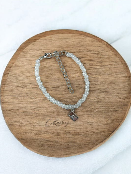 Bracelet femme courrier rocaille blanc nacré