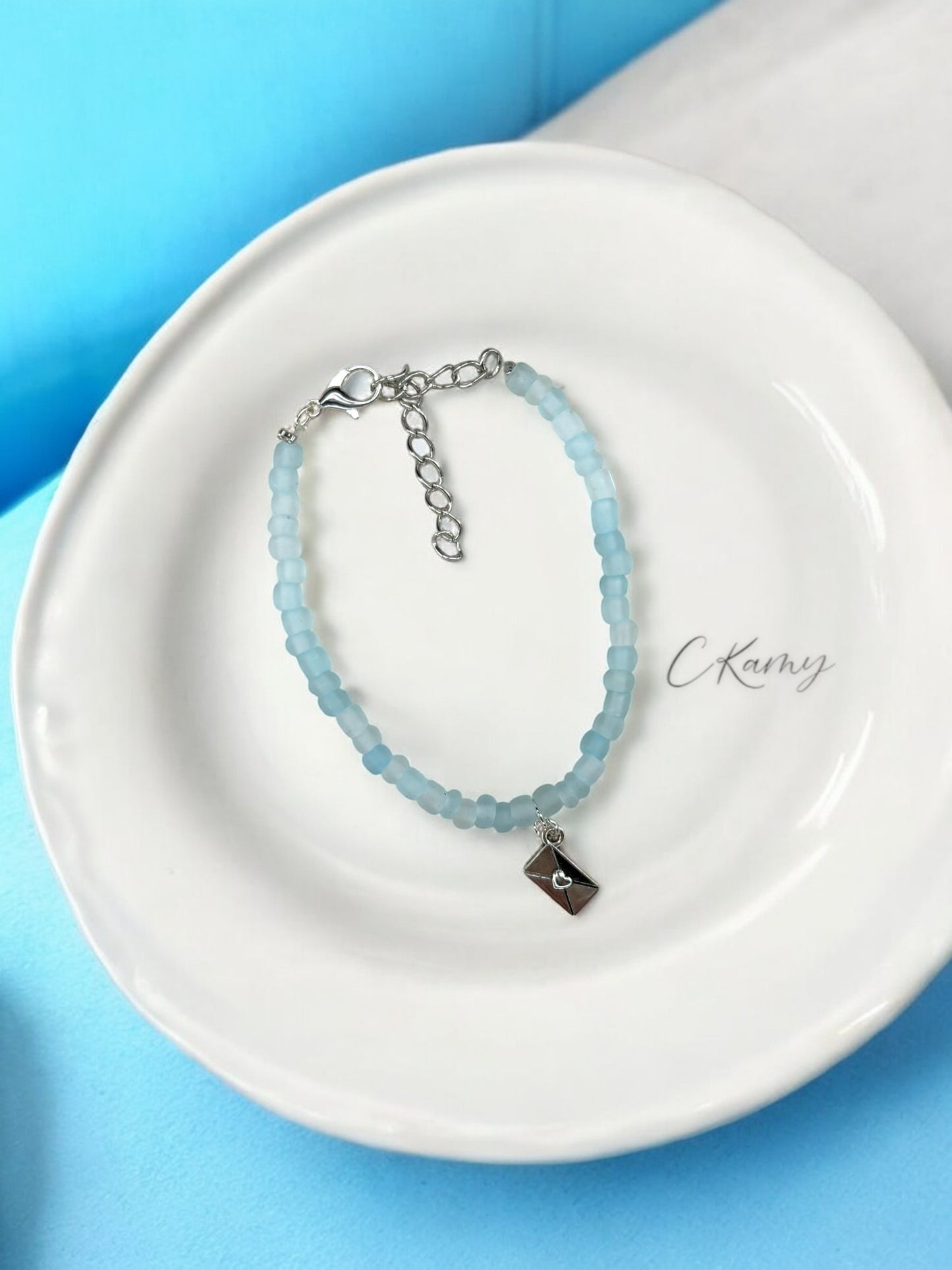 Bracelet femme courrier rocaille bleu transparent
