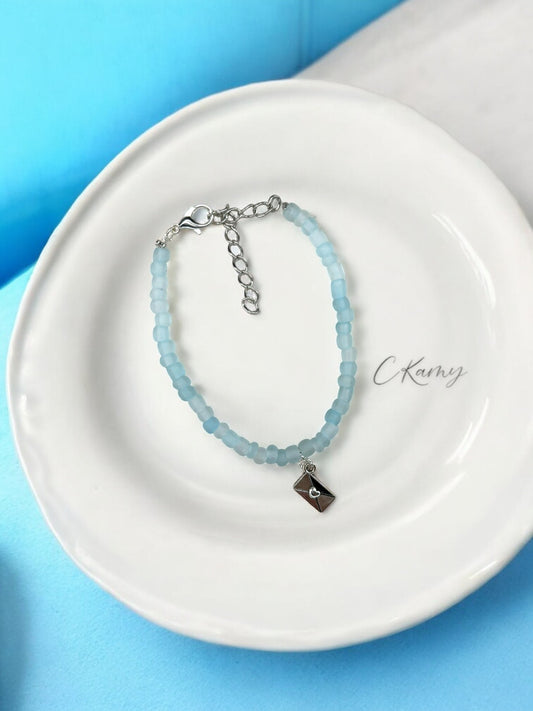 Bracelet femme courrier rocaille bleu transparent