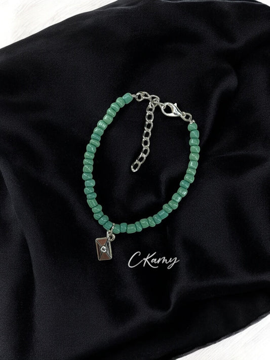 Bracelet femme courrier rocaille bleu vert clair