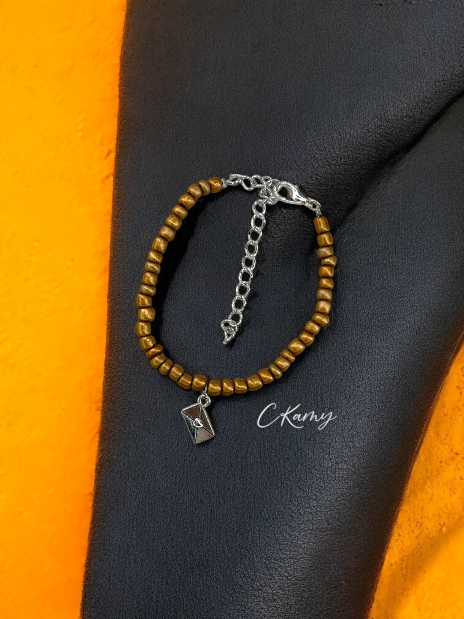 Bracelet femme courrier rocaille bronze
