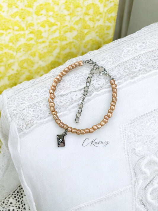 Bracelet femme courrier rocaille chair clair