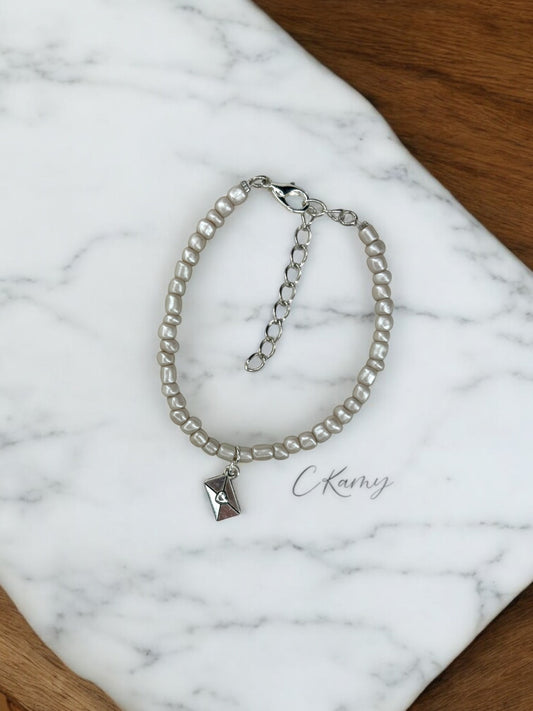 Bracelet femme courrier rocaille gris galet