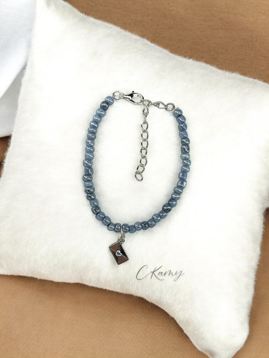 Bracelet femme courrier rocaille gris tacheté foncé