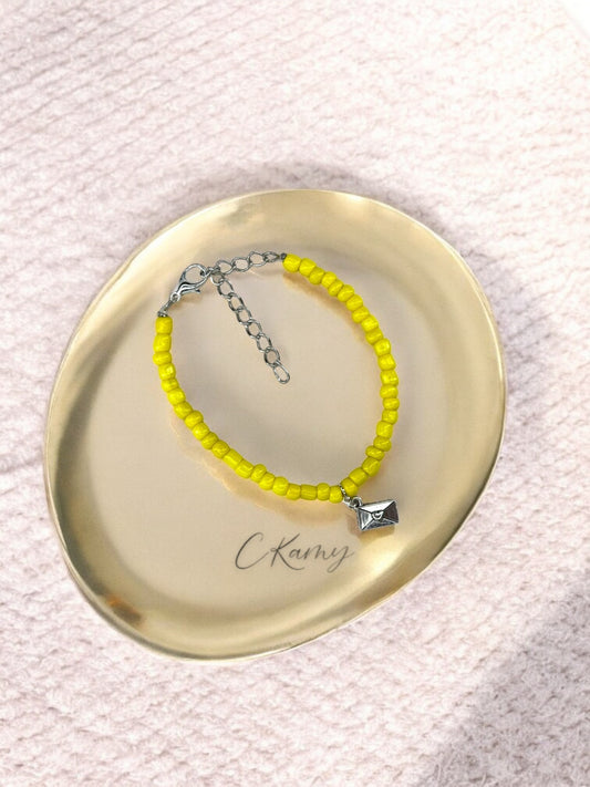 Bracelet femme courrier rocaille jaune