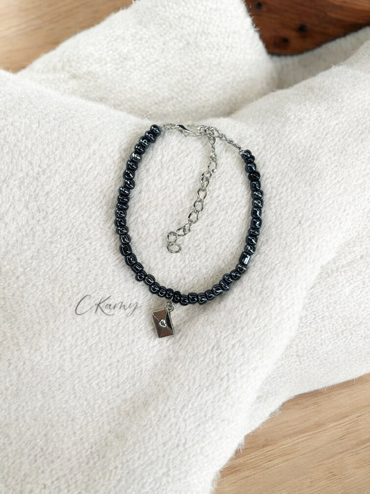 Bracelet femme courrier rocaille noir brillant