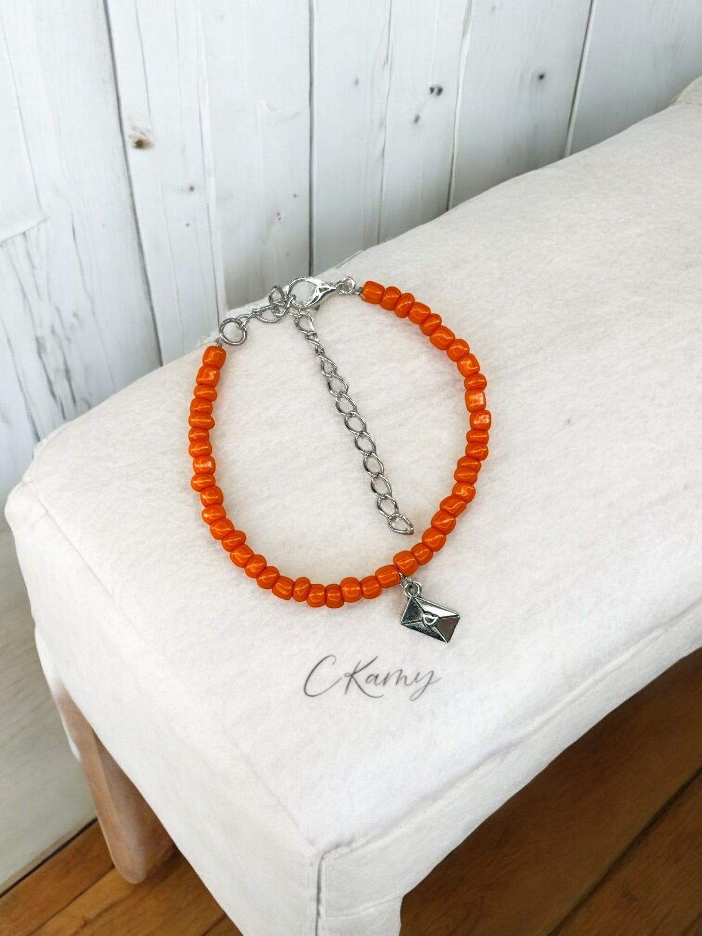 Bracelet femme courrier rocaille orange