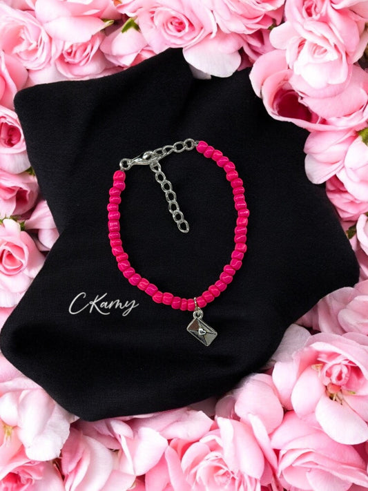 Bracelet femme courrier rocaille rose fuchsia