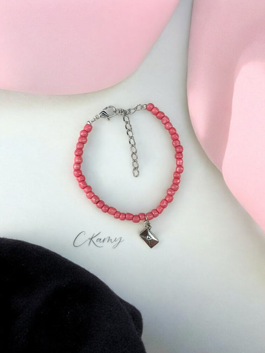 Bracelet femme courrier rocaille rose saumon