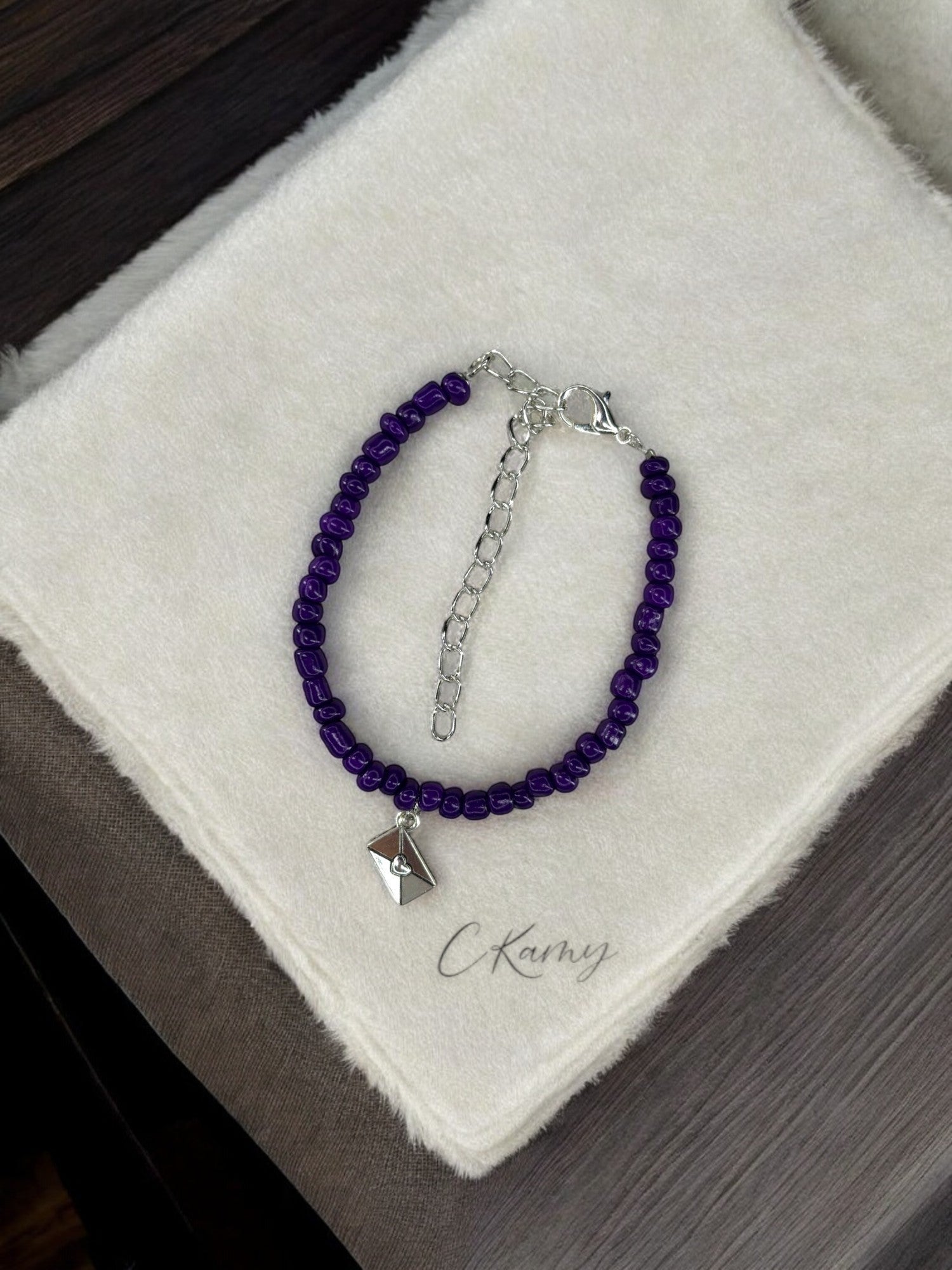 Bracelet femme courrier rocaille violet foncé