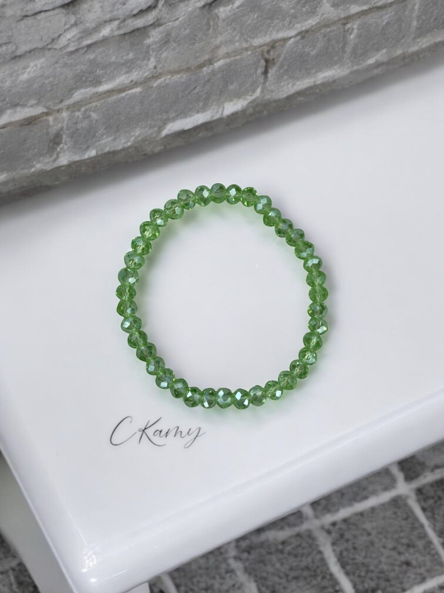 Bracelet femme facettes 6mm vert clair transparent