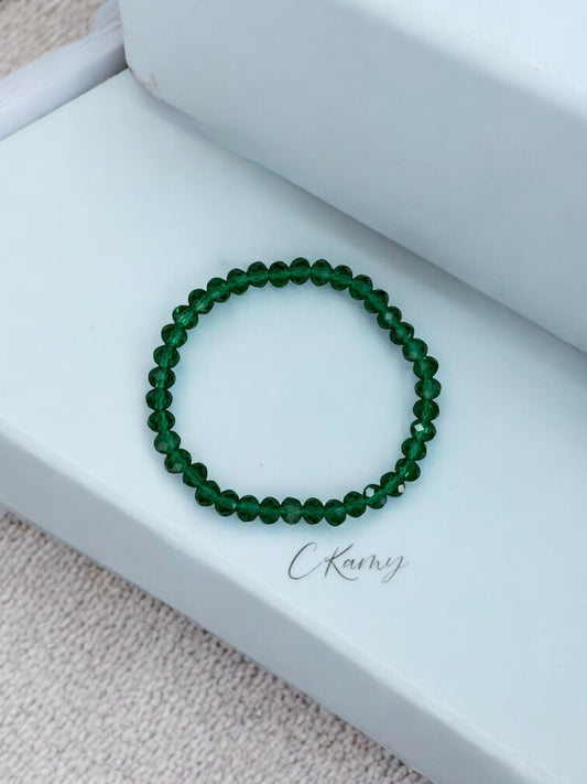 Bracelet femme facettes 6mm vert foncé transparent