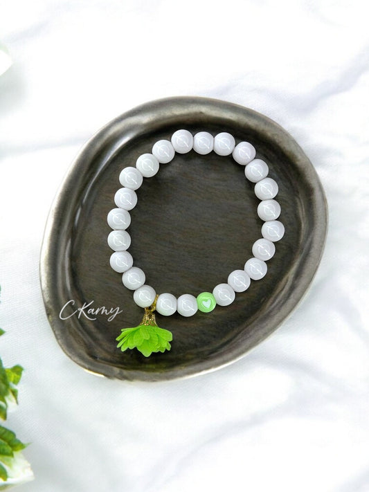 Bracelet femme fleur tissu vert clair coeur blanc