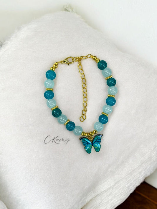 Bracelet femme papillon multicolore doré bleu turquoise bleu clair