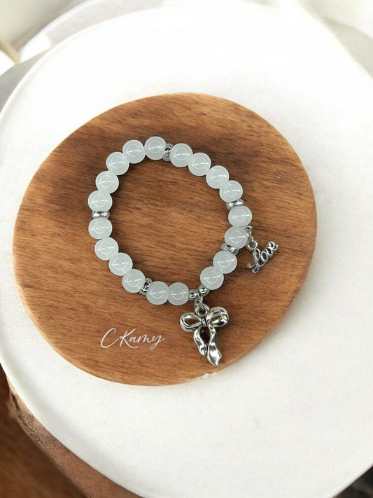 Bracelet femme perles de verre noeud love argent blanc
