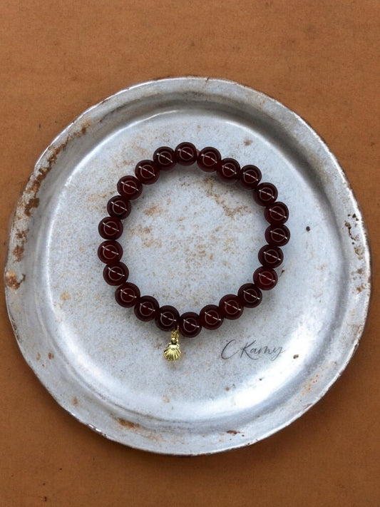 Bracelet femme perles de verres coquillage doré bordeaux