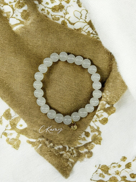 Bracelet femme perles de verres coquillage doré jaune clair