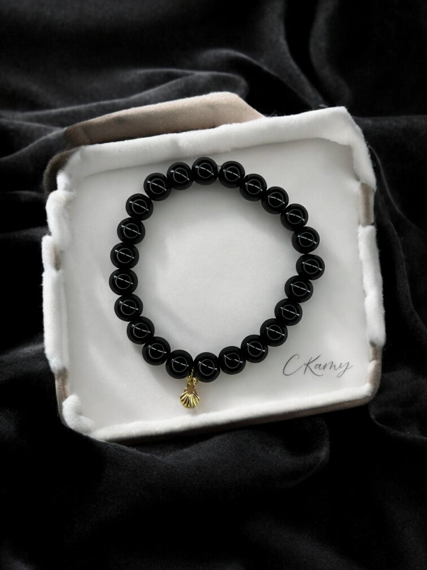 Bracelet femme perles de verres coquillage doré noir